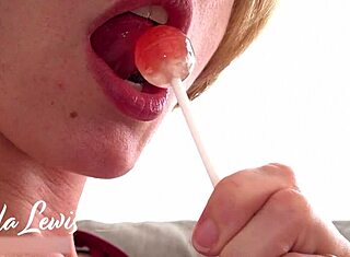 Amateur wife teasing and sucking on a candy treat in slow motion